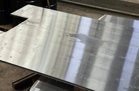 Finished ground plate with inspection markings